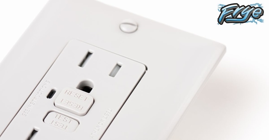 A hand adjusting the switch on a circuit breaker board.
